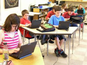 Students with laptops in Morristown